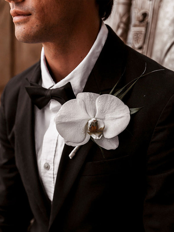 Phalaenopsis & Tropical Leaves Boutonniere